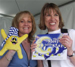 Kimberli (l) with a fan.